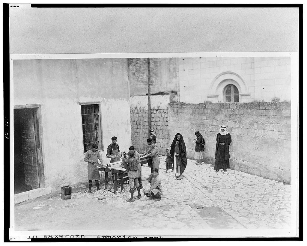 Near East Relief, "Armenian orphan wards of Near East Relief doing carpentry in courtyard of chapel in Nazareth, Palestine" ca. 1915-16 (LOC)